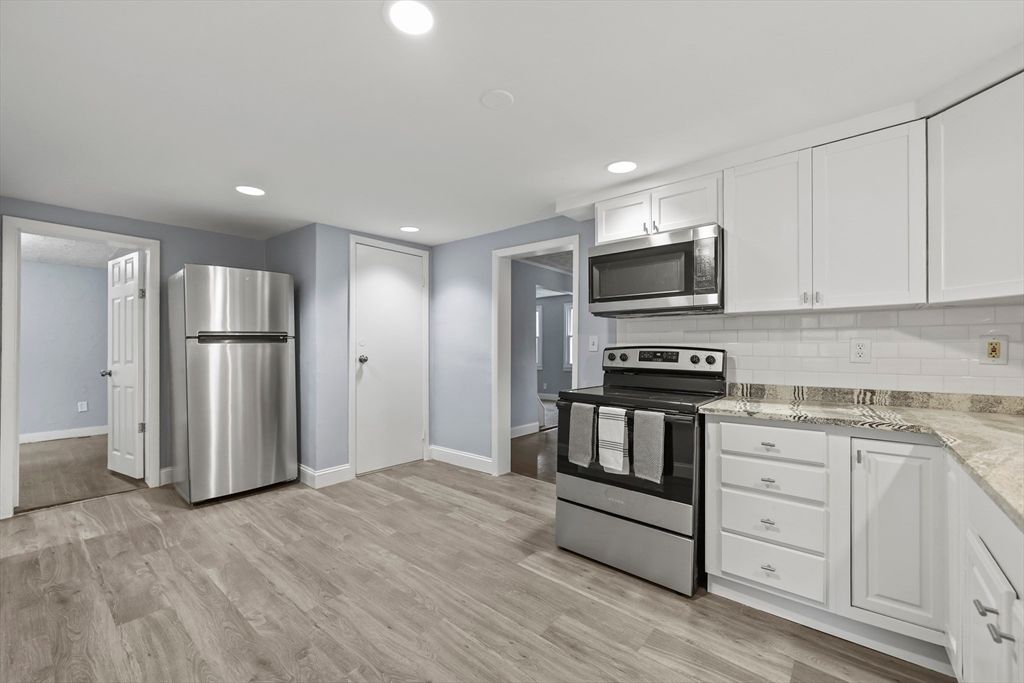 Interior, Kitchen, Recessed Lighting, Stainless Steel Appliances, Wood Texture Flooring