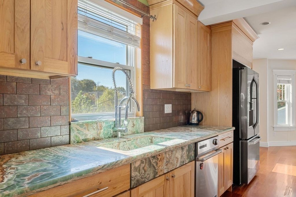 Interior, Kitchen, Recessed Lighting, Tile Countertops, Wood Texture Flooring