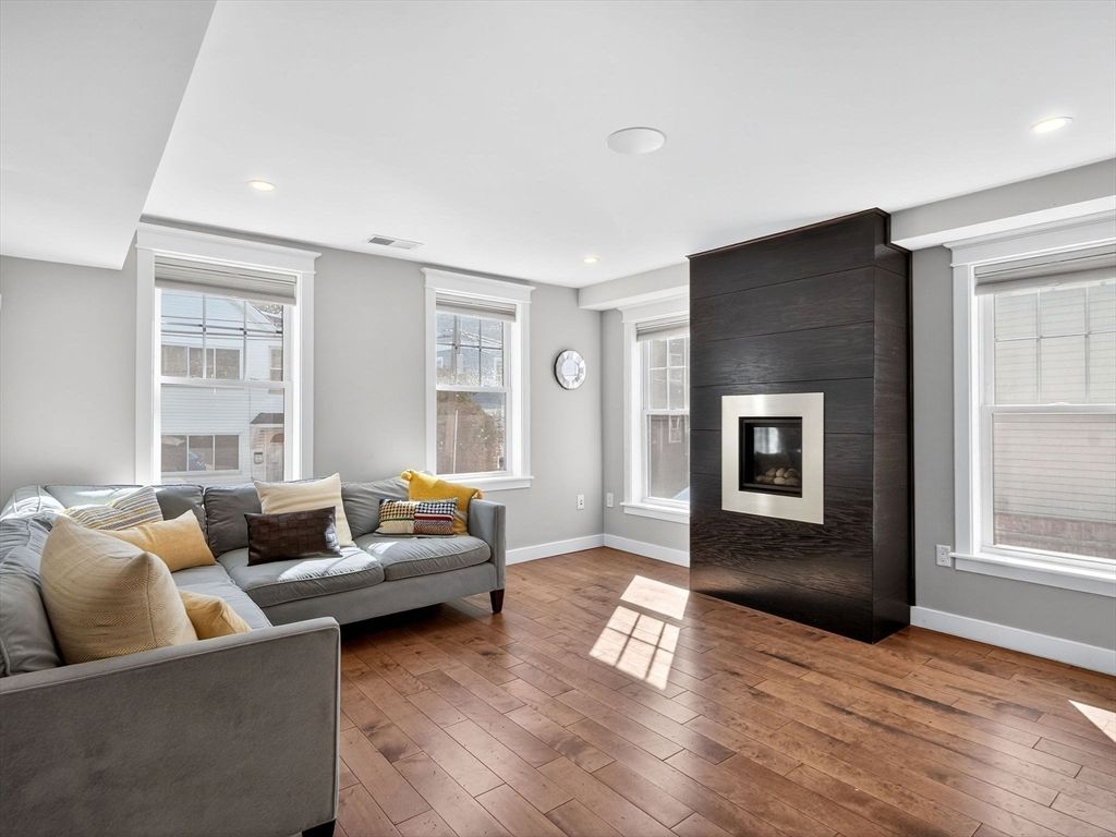 Fireplace, Interior, Living room, Recessed Lighting, Wood Texture Flooring