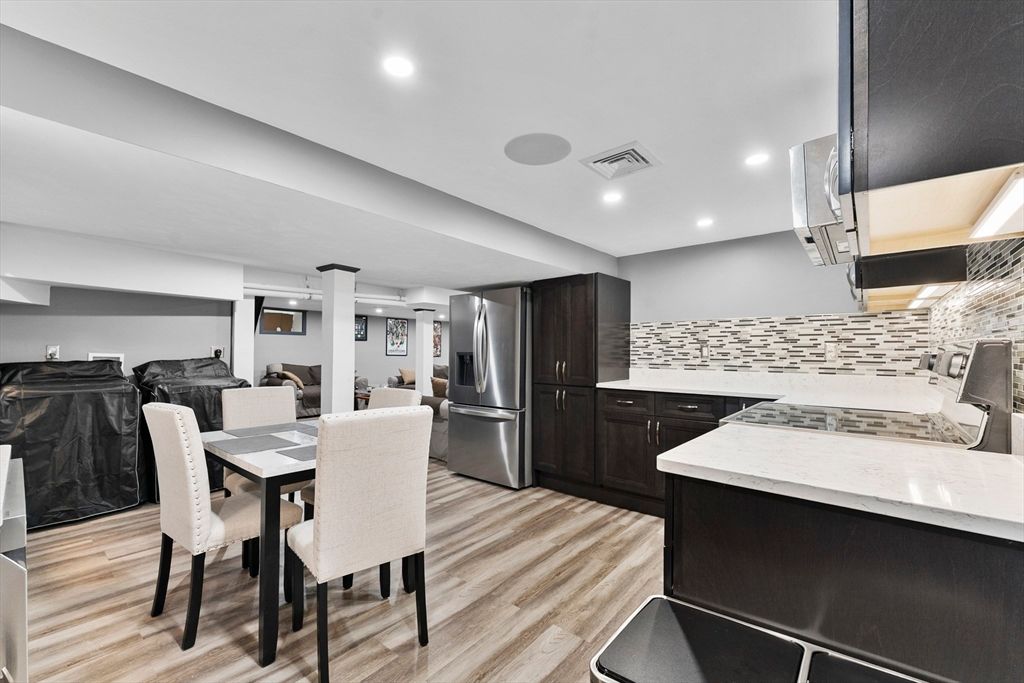Dining room, Interior, Kitchen, Recessed Lighting, Stainless Steel Appliances, Wood Texture Flooring