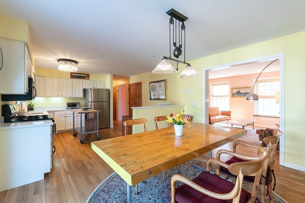 Dining room, Interior, Kitchen, Pendant Lights, Stainless Steel Appliances, Wood Texture Flooring