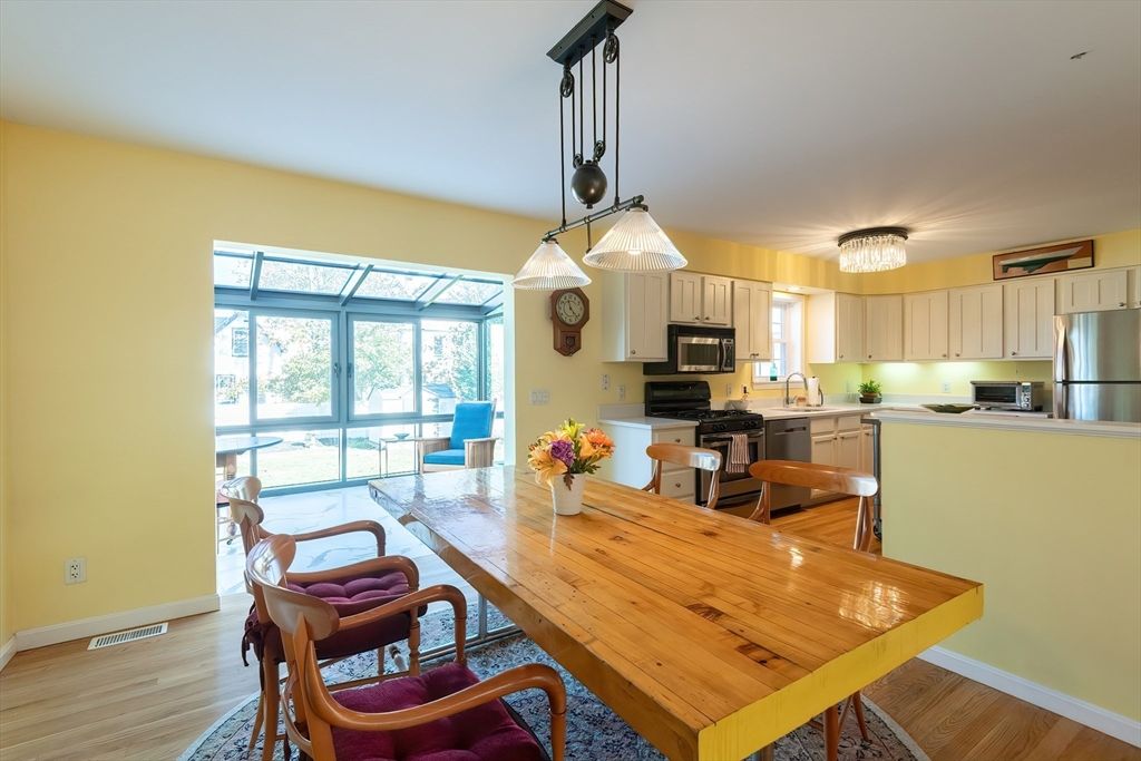 Dining room, Interior, Kitchen, Pendant Lights, Stainless Steel Appliances, Wood Texture Flooring