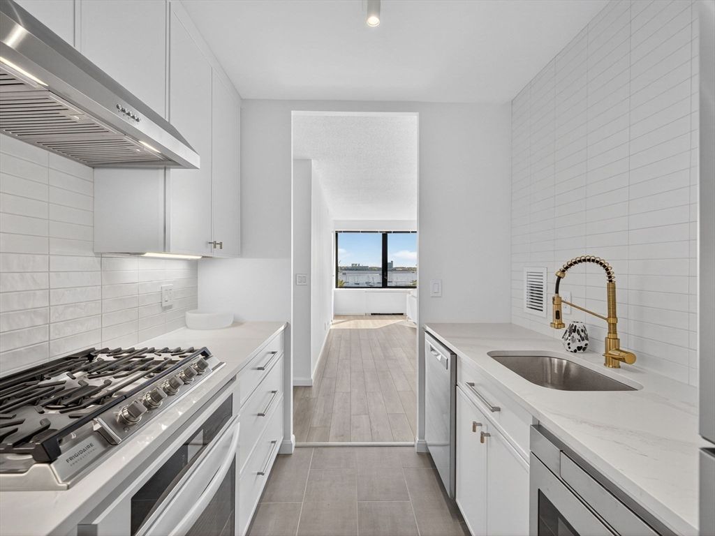 Interior, Kitchen, Recessed Lighting, Stainless Steel Appliances, Water, Wood Texture Flooring