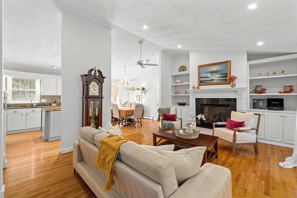 Chandelier, Dining room, Fireplace, Interior, Living room, Recessed Lighting, Wood Texture Flooring