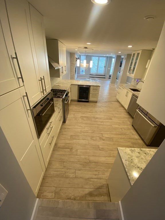 Interior, Kitchen, Pendant Lights, Recessed Lighting, Stainless Steel Appliances, Wood Texture Flooring