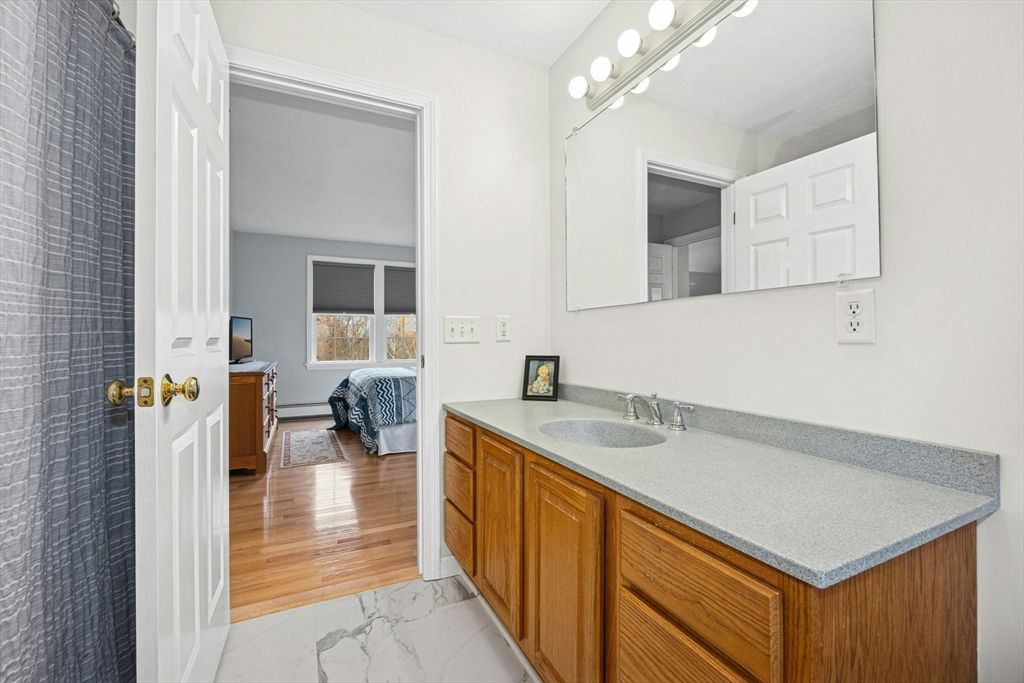 Bathroom, Dual Sink Vanities, Interior, Marble, Wood Texture Flooring