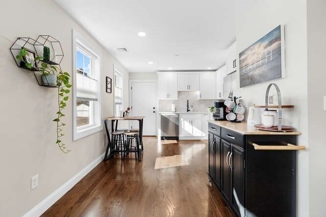 Dining room, Interior, Kitchen, Recessed Lighting, Stainless Steel Appliances, Wood Texture Flooring