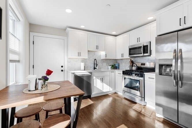 Dining room, Interior, Kitchen, Recessed Lighting, Stainless Steel Appliances, Wood Texture Flooring