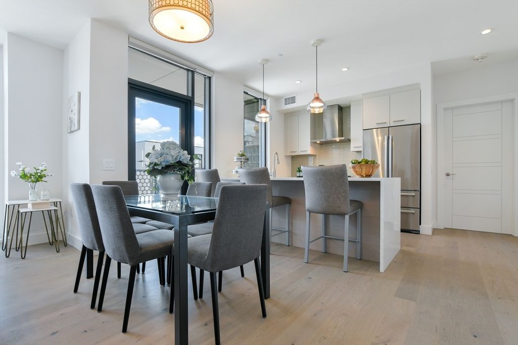 Dining room, Interior, Kitchen, Pendant Lights, Recessed Lighting, Stainless Steel Appliances, Wood Texture Flooring