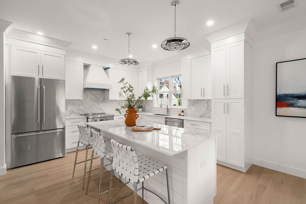 Interior, Kitchen, Marble Walls, Pendant Lights, Recessed Lighting, Stainless Steel Appliances, Wood Texture Flooring