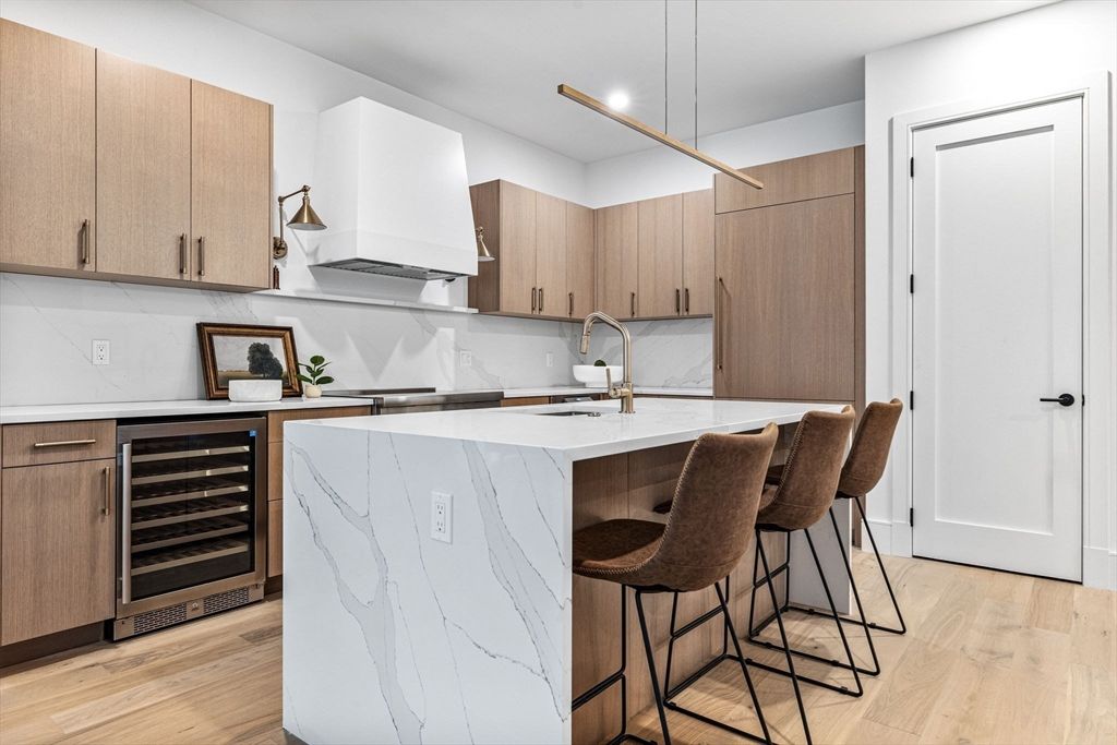 Interior, Kitchen, Marble Walls, Pendant Lights, Recessed Lighting, Wood Texture Flooring