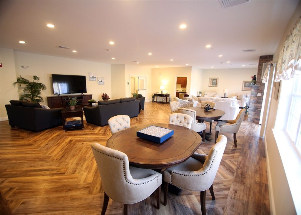 Dining room, Fireplace, Interior, Living room, Recessed Lighting, Wood Texture Flooring