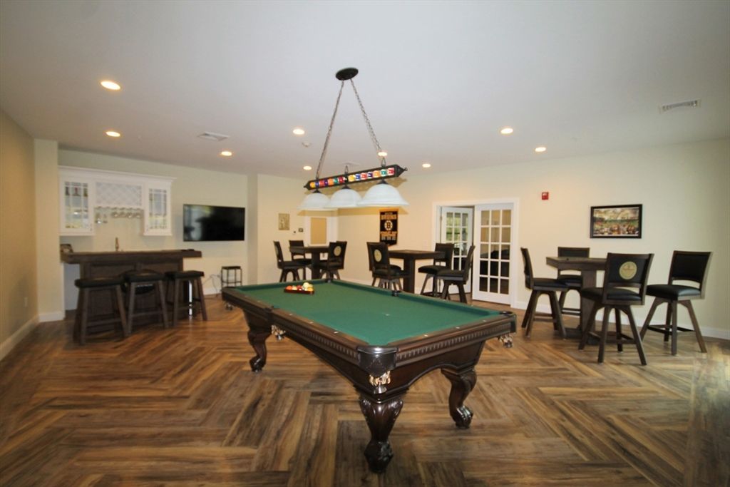 Billiard Table, Chandelier, Dining room, Game Room, Interior, Pendant Lights, Recessed Lighting, Wood Texture Flooring