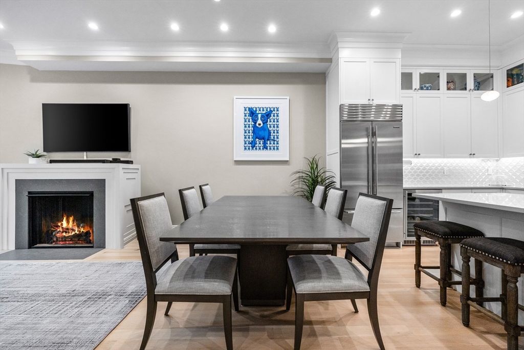 Dining room, Fireplace, Interior, Kitchen, Pendant Lights, Recessed Lighting, Stainless Steel Appliances, Wood Texture Flooring