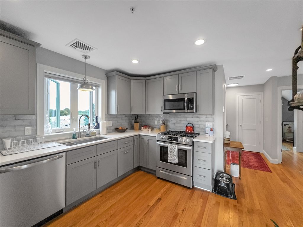 Interior, Kitchen, Pendant Lights, Recessed Lighting, Stainless Steel Appliances, Wood Texture Flooring