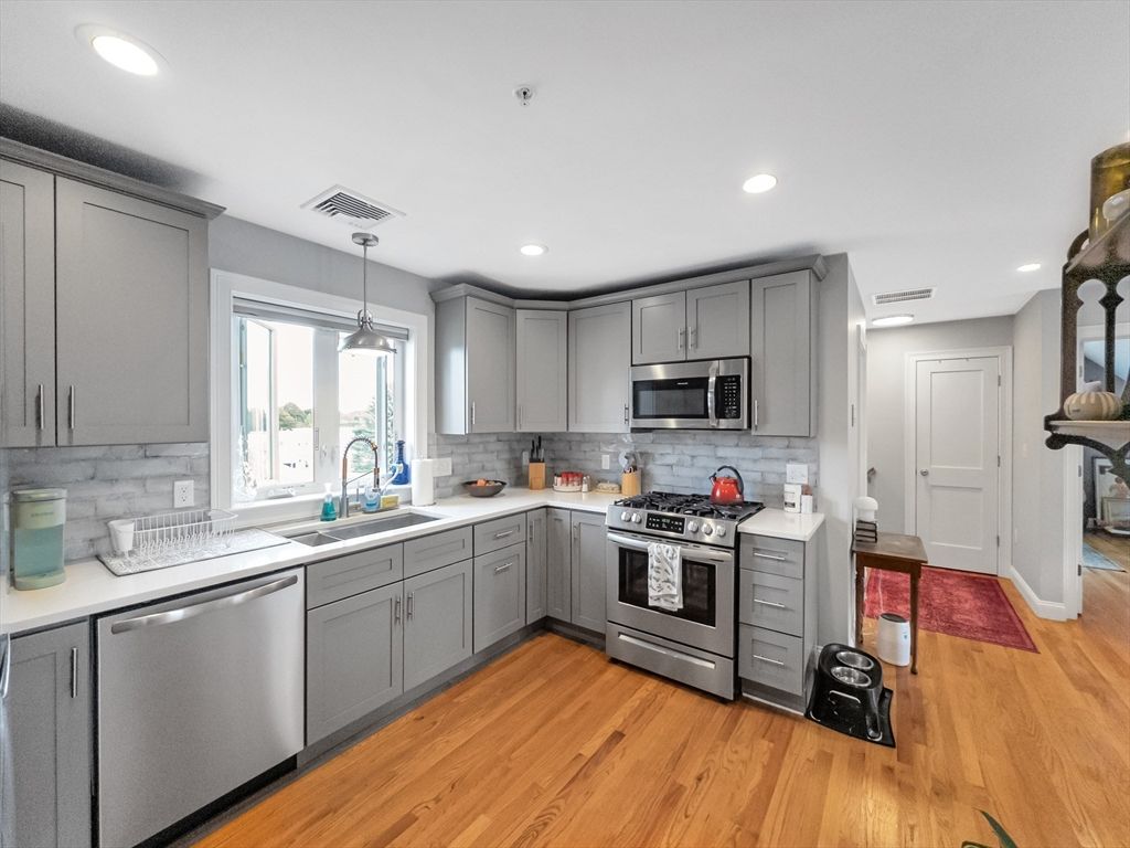 Interior, Kitchen, Pendant Lights, Recessed Lighting, Stainless Steel Appliances, Wood Texture Flooring