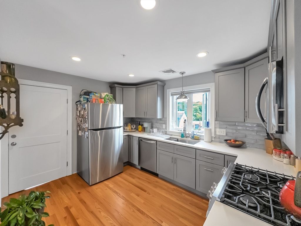 Interior, Kitchen, Pendant Lights, Recessed Lighting, Stainless Steel Appliances, Wood Texture Flooring