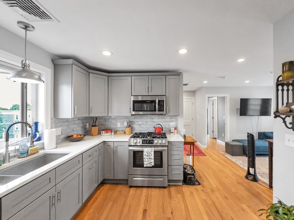 Interior, Kitchen, Pendant Lights, Recessed Lighting, Stainless Steel Appliances, Wood Texture Flooring