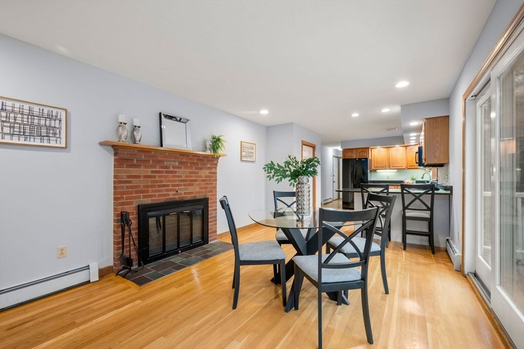 Dining room, Fireplace, Interior, Kitchen, Recessed Lighting, Wood Texture Flooring