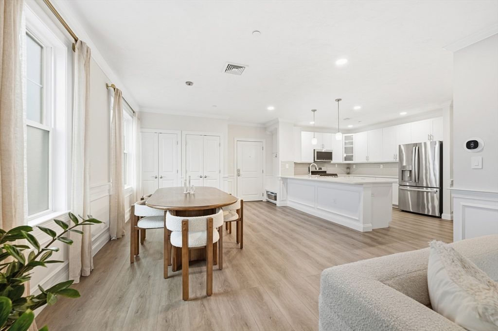 Dining room, Interior, Kitchen, Pendant Lights, Recessed Lighting, Stainless Steel Appliances, Wood Texture Flooring