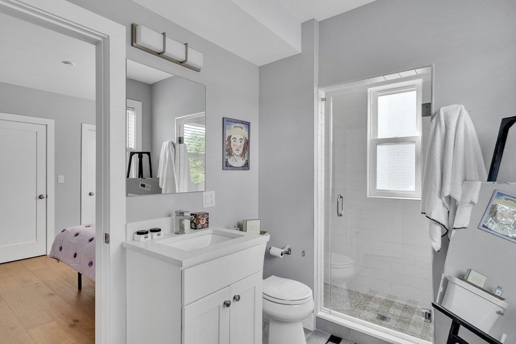 Bathroom, Dual Sink Vanities, Glass Shower, Interior, Wood Texture Flooring