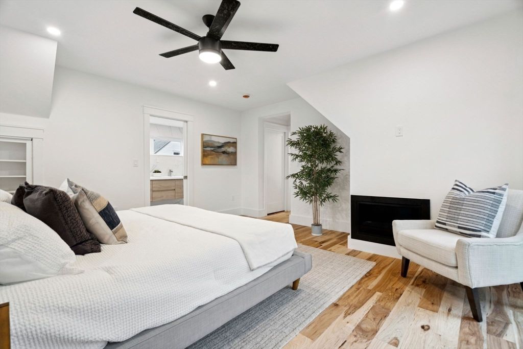 Bedroom, Fireplace, Interior, Recessed Lighting, Wood Texture Flooring