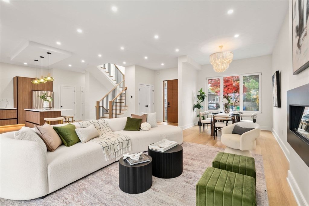 Chandelier, Dining room, Fireplace, Interior, Living room, Pendant Lights, Recessed Lighting, Wood Texture Flooring