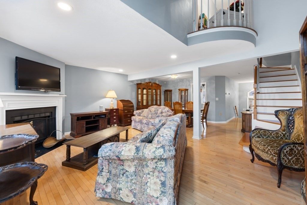 Dining room, Fireplace, Interior, Living room, Recessed Lighting, Wood Texture Flooring