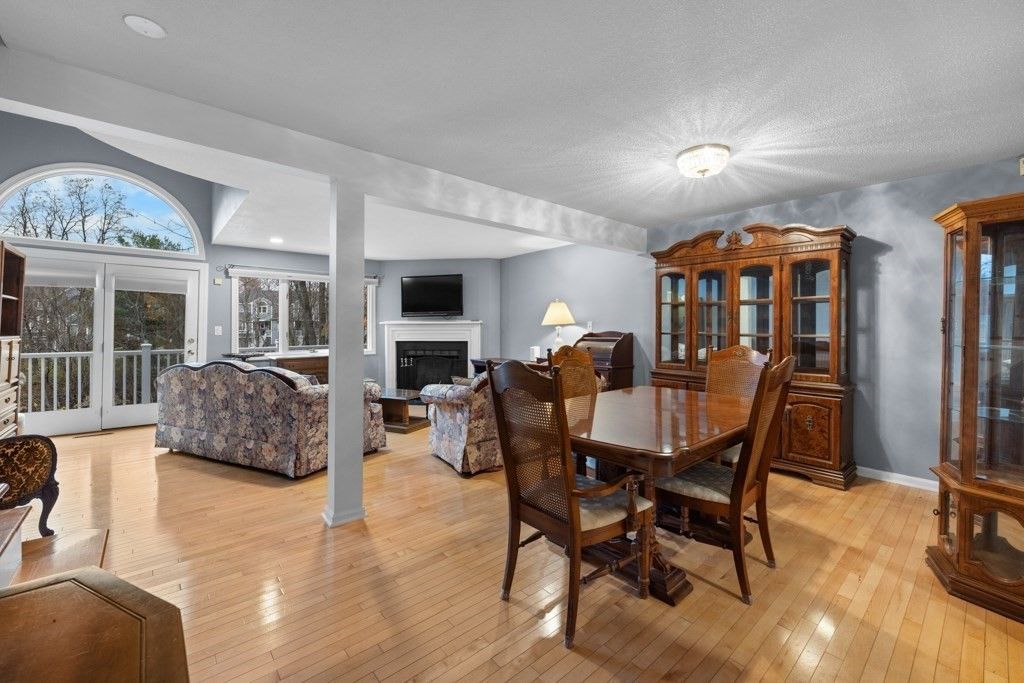 Dining room, Fireplace, Interior, Living room, Recessed Lighting, Wood Texture Flooring