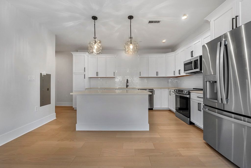 Interior, Kitchen, Pendant Lights, Recessed Lighting, Stainless Steel Appliances, Wood Texture Flooring