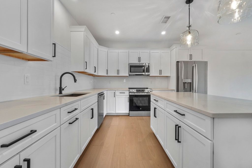 Interior, Kitchen, Pendant Lights, Recessed Lighting, Stainless Steel Appliances, Wood Texture Flooring