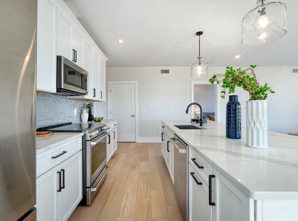 Interior, Kitchen, Pendant Lights, Recessed Lighting, Stainless Steel Appliances, Wood Texture Flooring