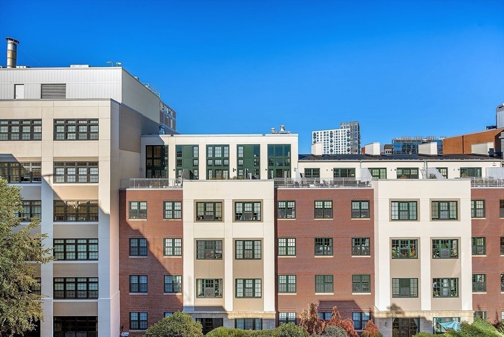 Exterior, Facade, Brick Facade, Condo Building