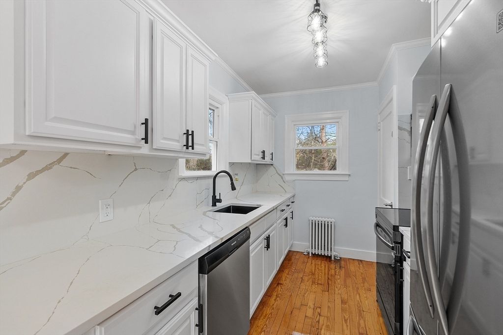 Interior, Kitchen, Marble Walls, Stainless Steel Appliances, Wood Texture Flooring