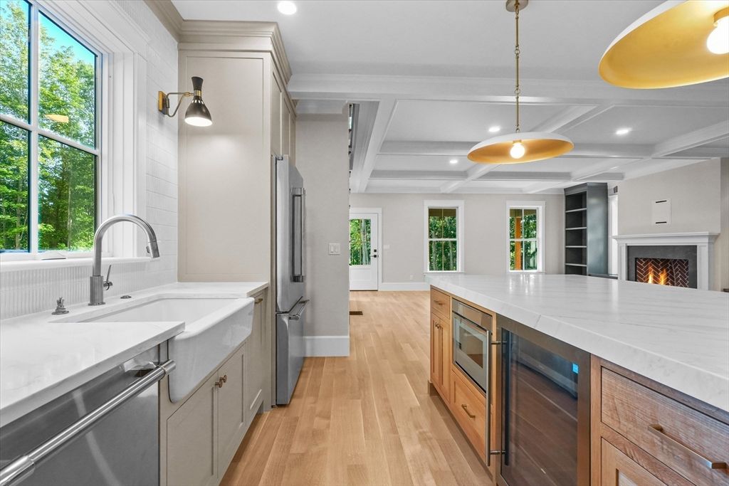 Fireplace, Interior, Kitchen, Pendant Lights, Recessed Lighting, Stainless Steel Appliances, Wood Texture Flooring