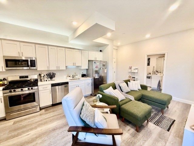 Interior, Kitchen, Living room, Recessed Lighting, Stainless Steel Appliances, Wood Texture Flooring