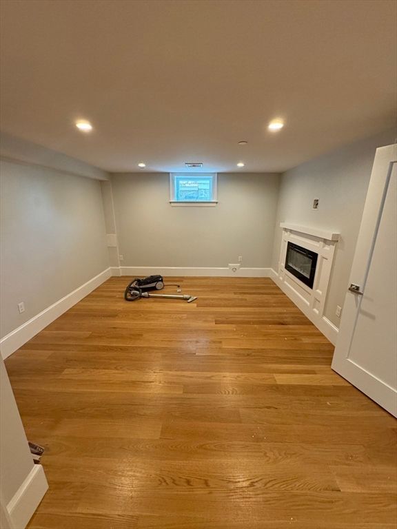 Empty room, Fireplace, Interior, Recessed Lighting, Wood Texture Flooring