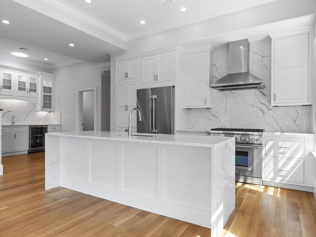 Interior, Kitchen, Marble Walls, Recessed Lighting, Stainless Steel Appliances, Wood Texture Flooring