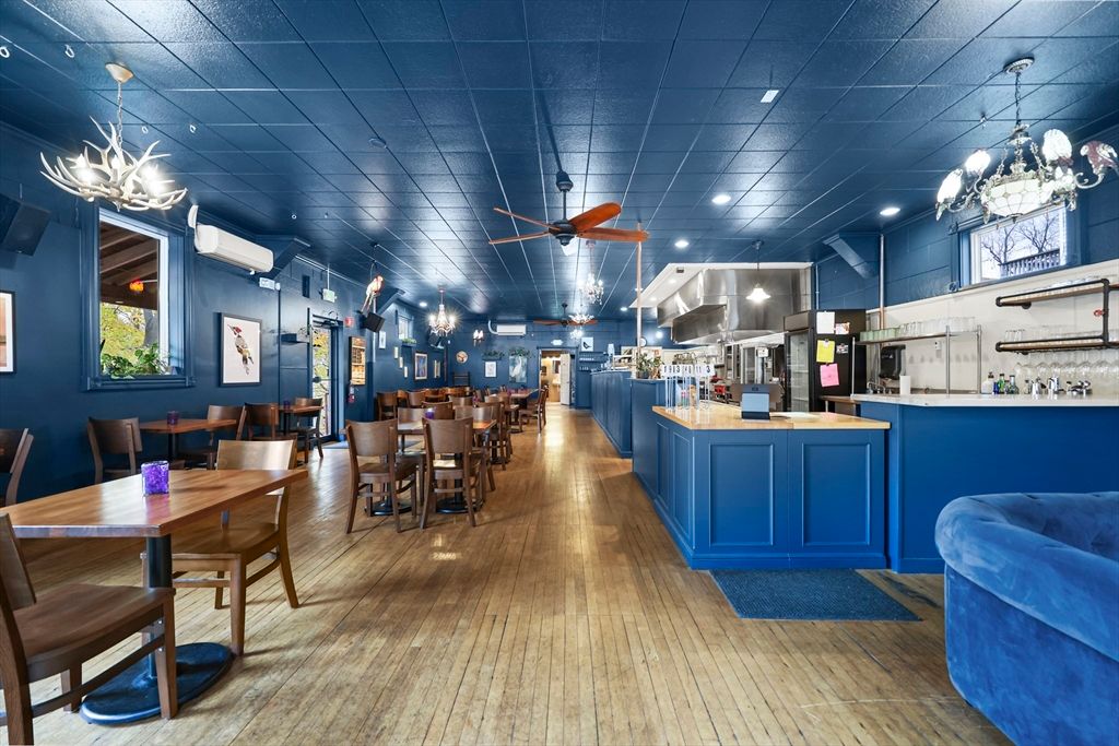 Chandelier, Dining room, Interior, Kitchen, Pendant Lights, Recessed Lighting, Stainless Steel Appliances, Wood Texture Flooring