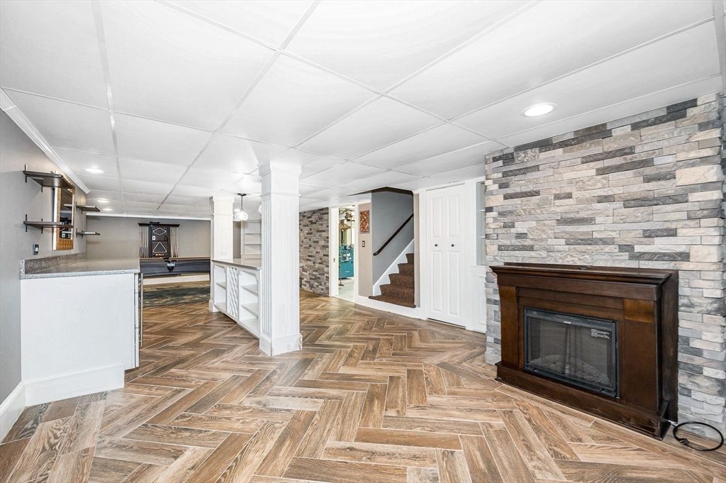 Fireplace, Interior, Kitchen, Pendant Lights, Recessed Lighting, Stone Walls, Wood Texture Flooring