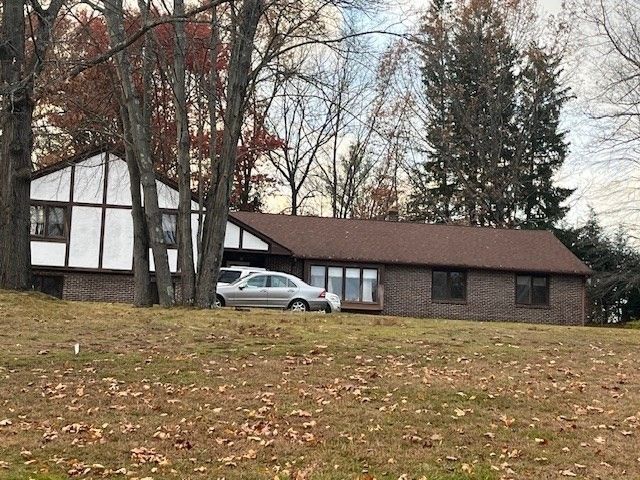 Attached, Exterior, Facade, Brick Facade, Tudor Revival