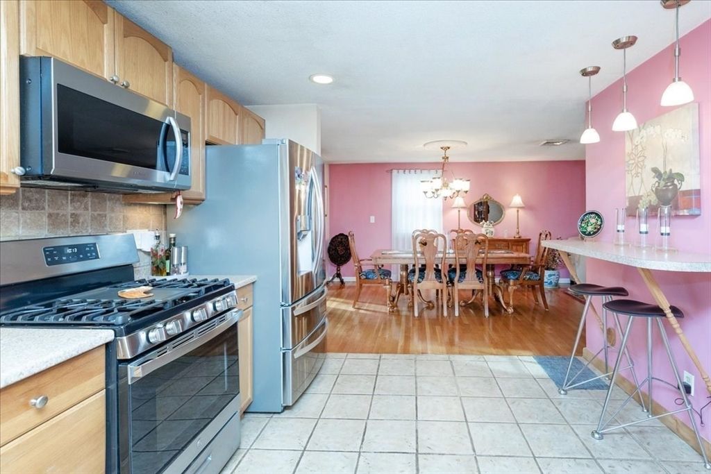 Chandelier, Dining room, Interior, Kitchen, Pendant Lights, Recessed Lighting, Stainless Steel Appliances, Wood Texture Flooring