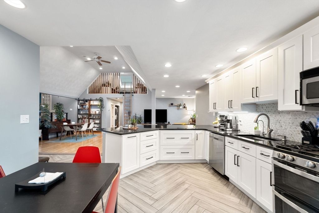 Dining room, Interior, Kitchen, Recessed Lighting, Stainless Steel Appliances, Wood Texture Flooring
