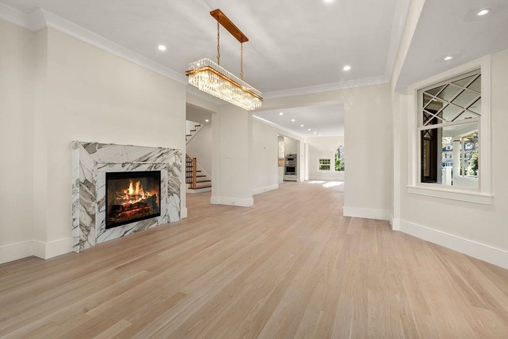 Chandelier, Empty room, Fireplace, Interior, Recessed Lighting, Wood Texture Flooring