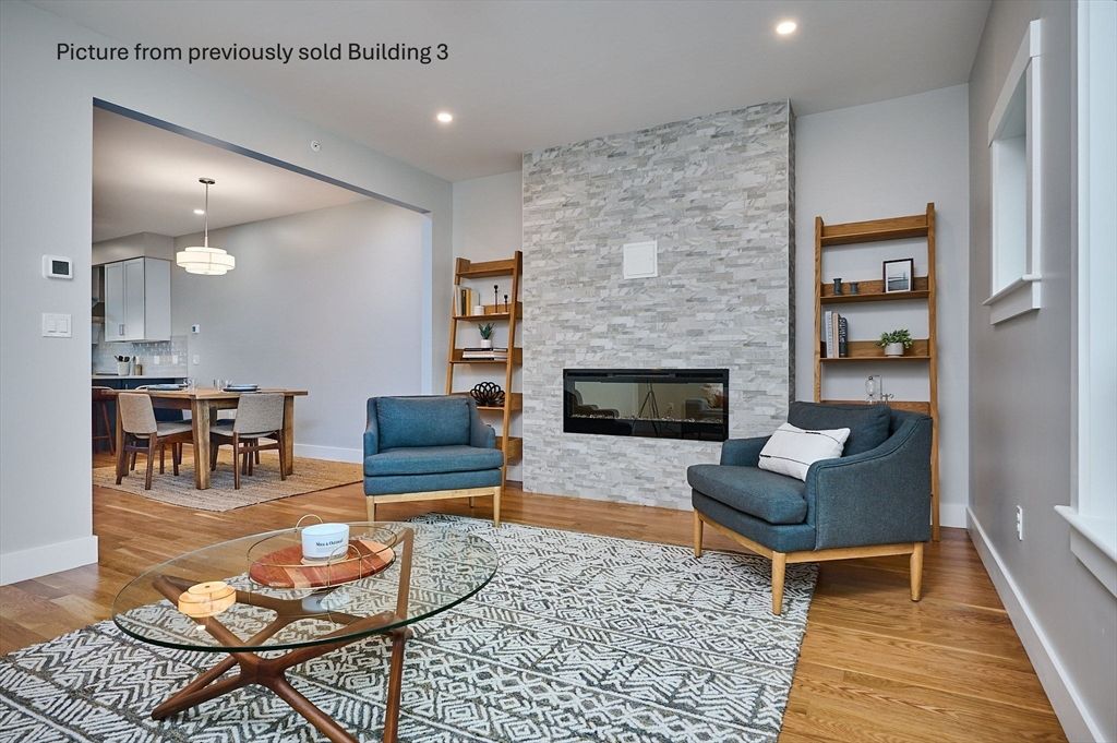 Dining room, Fireplace, Interior, Living room, Pendant Lights, Recessed Lighting, Stone Walls, Wood Texture Flooring