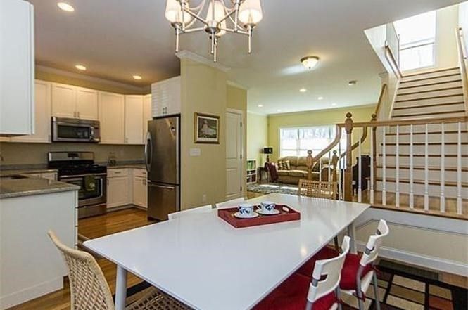 Chandelier, Dining room, Interior, Kitchen, Living room, Recessed Lighting, Stainless Steel Appliances, Wood Texture Flooring