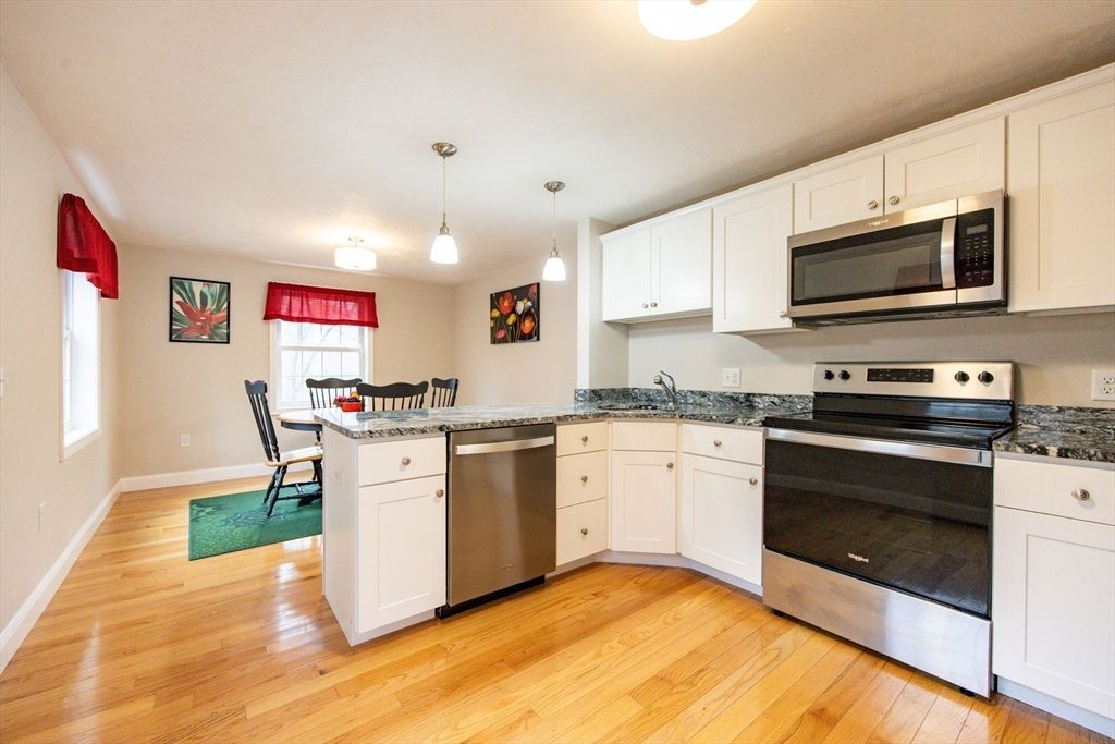 Dining room, Interior, Kitchen, Pendant Lights, Stainless Steel Appliances, Wood Texture Flooring