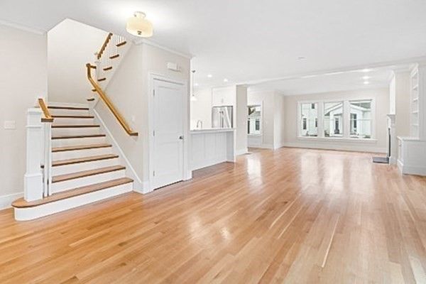 Empty room, Interior, Kitchen, Recessed Lighting, Stainless Steel Appliances, Wood Texture Flooring