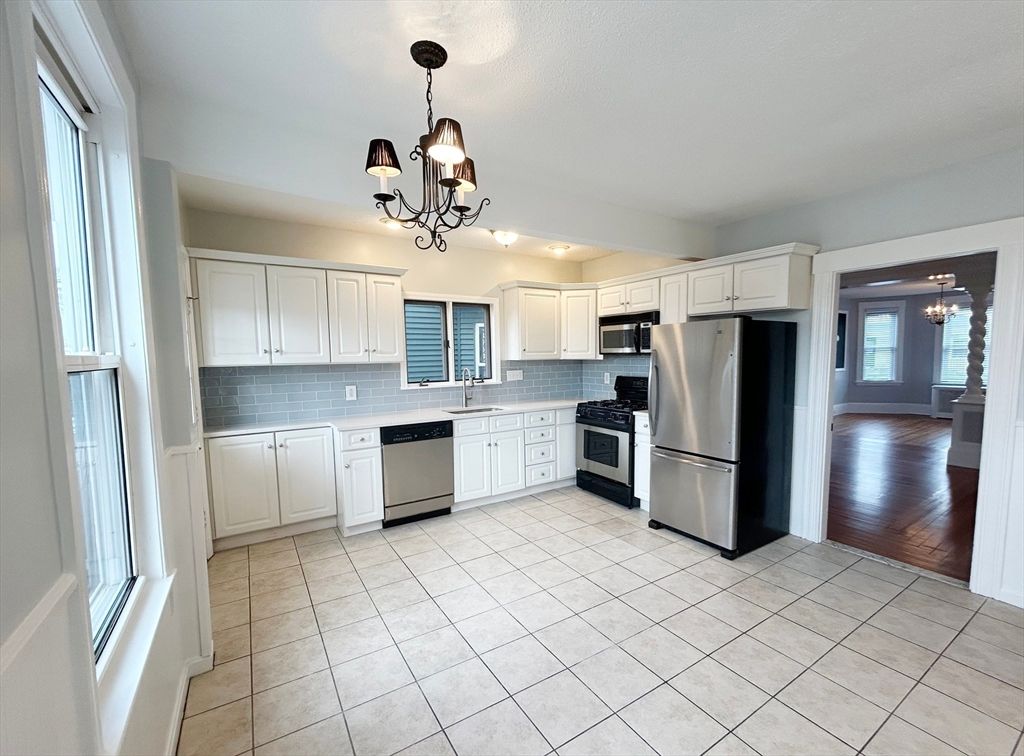 Chandelier, Interior, Kitchen, Pendant Lights, Stainless Steel Appliances, Wood Texture Flooring