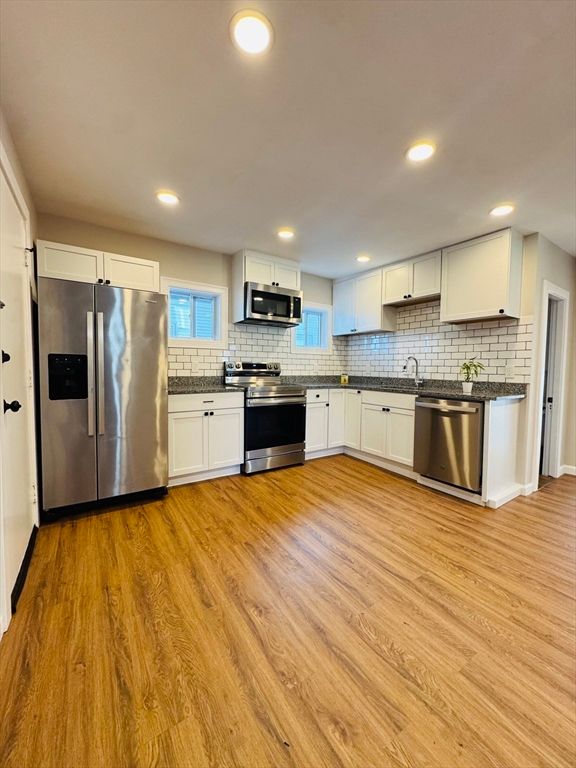 Interior, Kitchen, Recessed Lighting, Stainless Steel Appliances, Wood Texture Flooring